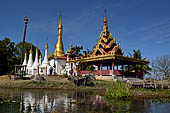 Inle Lake Myanmar. All the buildings are constructed on piles. Residents travel around by canoe, but there are also bamboo walkways and bridges over the canals, monasteries and stupas. 